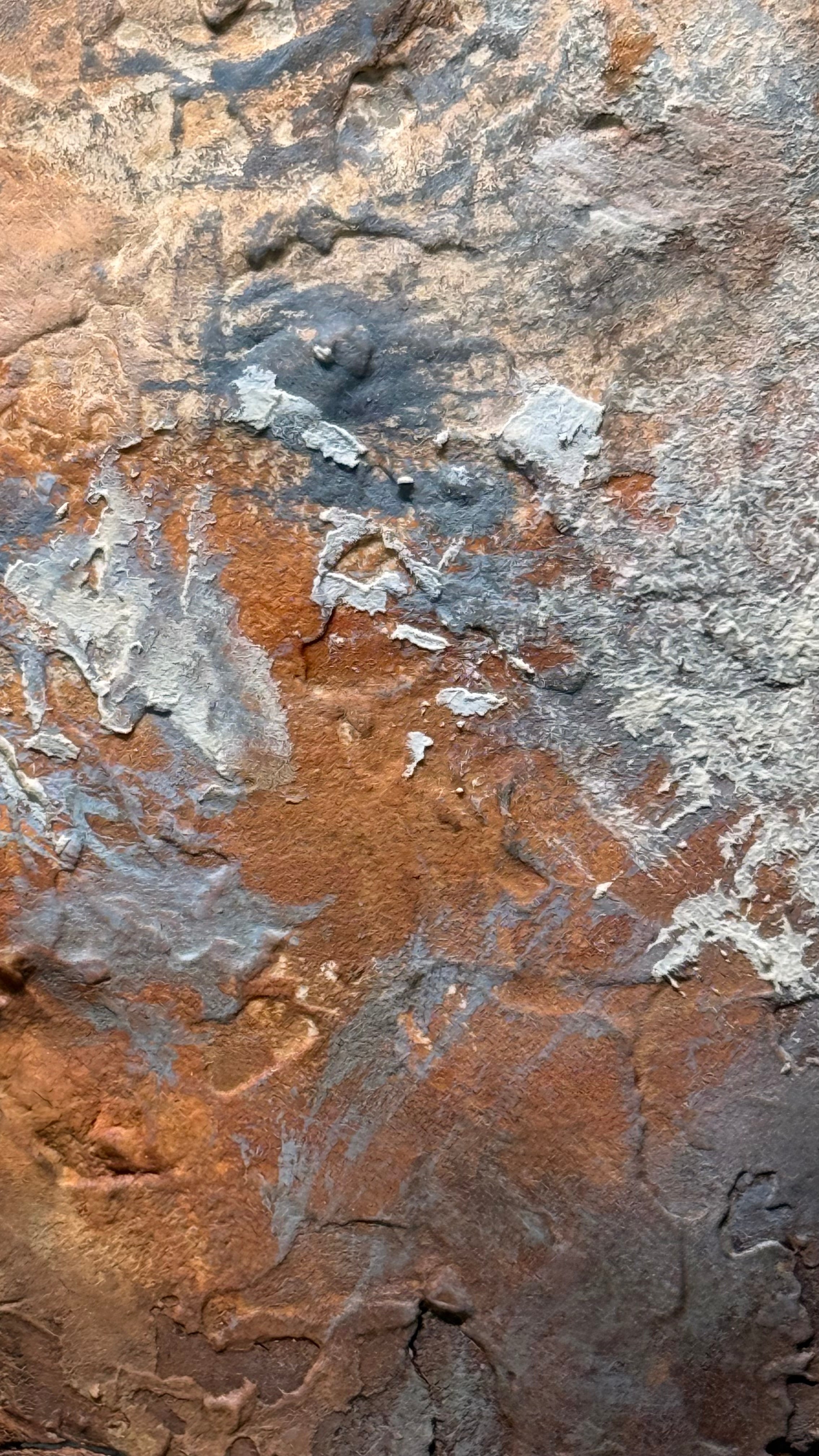 Detail of layered mixed media surface with softened forms suggesting ancient trade vessels and passage over time